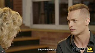 Blonde Mommy Seductively Proposes Pleasure on Sofa