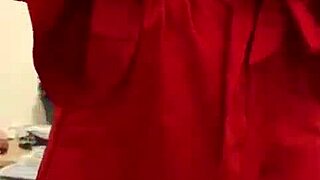 she says, look at me in this red lingerie, touching my big tits.