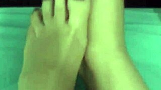 Latina sexy girl shows her feet in solo fetish video