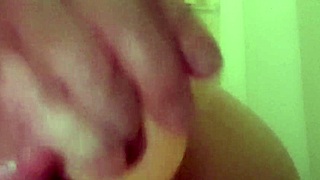 Feeling intense pleasure as I fuck my ass with a dildo in the shower