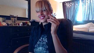 Sandi lights up 3 brown cork cigarettes for fans