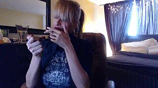 Sandi lights up 3 brown cork cigarettes for fans