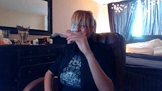 Sandi lights up 3 brown cork cigarettes for fans