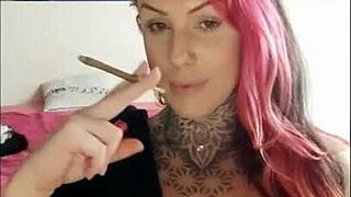 Tattooed wife smoking on webcam