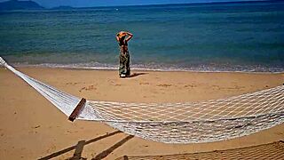 long dress, no panties, flashing on a public beach