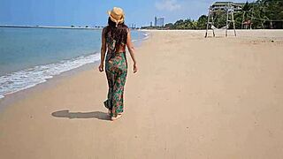 long dress, no panties, flashing on a public beach