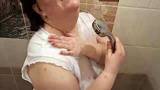 Big wet titties bouncing in t-shirt under steamy shower with wild blowjob