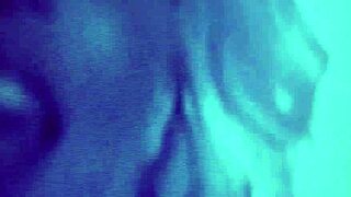 Female and male strippers intensely undress and dance, teasing the audience with erotic striptease.