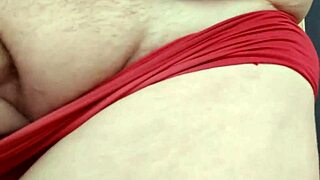 chubby shemale casually plays with her cock close up