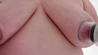 Amateur explores nipple suction on her tits.