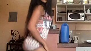 Filipina babe teases with a slow, seductive dance and striptease.