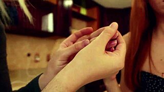 Redhead Lizzy Lamb poses as a real doll in an intense freeze fetish scene.