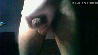 guy strokes his hairy cock