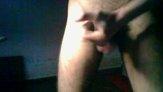 guy strokes his hairy cock
