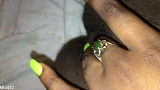 Fingering my tight black creamy pink pussy, feeling every wet touch as an old ebony woman craves more.