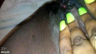 Fingering my tight black creamy pink pussy, feeling every wet touch as an old ebony woman craves more.