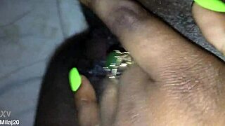 Fingering my tight black creamy pink pussy, feeling every wet touch as an old ebony woman craves more.