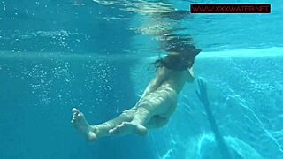 Watch Lina Mercury and Mia Ferrari dive naked in public pool.