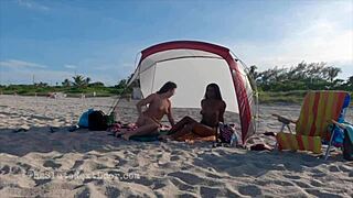 Double Handjob on Public Beach with Interracial Action