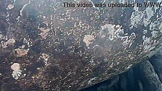 watch this african novinha bent over in doggystyle on beach rocks, watched and interrupted? public gay sex!