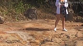 watch this african novinha bent over in doggystyle on beach rocks, watched and interrupted? public gay sex!