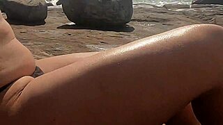 watch this african novinha bent over in doggystyle on beach rocks, watched and interrupted? public gay sex!