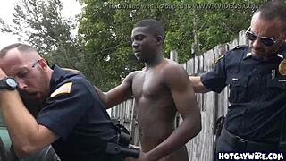 Two police officers corner a black guy in the office, taking turns with his cock in a heated interracial encounter