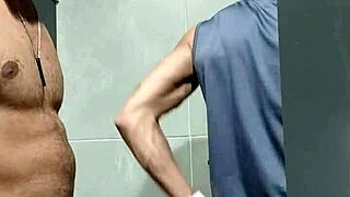 Muscular hunk gets assfucking in the gym restroom