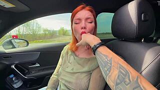 Redhead amateur swallows driver's cum after deepthroat with big natural tits