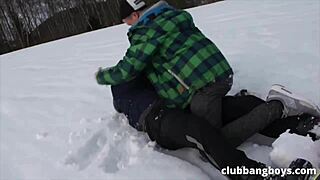 Three gay snowboarders have some fun after the slope.