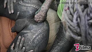 Extreme sissy anal stretching with tattooed femdom fisting a skinny slut's pierced nipples