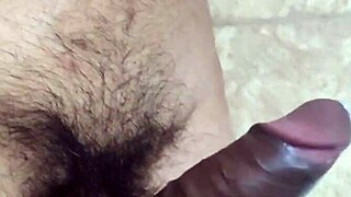Watch this gay guy play with his belly and cum?