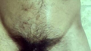 Watch this gay guy play with his belly and cum?