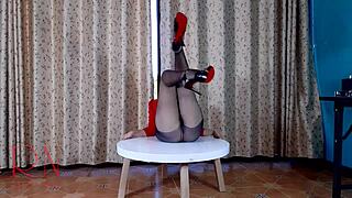 yo, check this nice lady in pantyhose and heels stripping at the round table c1