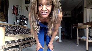 Ginger Moisther teases in blue with nipple play and licks