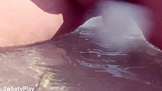 Chubby babe with shaved pussy caught peeing on public beach.