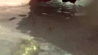 Chubby babe with shaved pussy caught peeing on public beach.