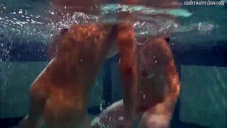 Lesbians katka and barbara bounce underwater in the pool