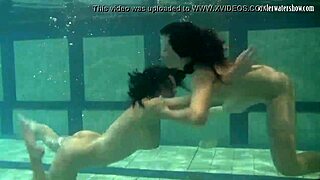 Lesbians katka and barbara bounce underwater in the pool
