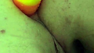 chubby brunette amateur uses rainbow dildo for anal gaping and creampie