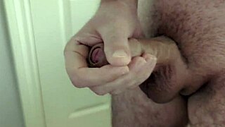 Slow Motion Cumshot Captured in Bathroom During Intense Solo Masturbation Session