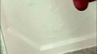 Blonde bodybuilder showers muscular cock with blue eyes!