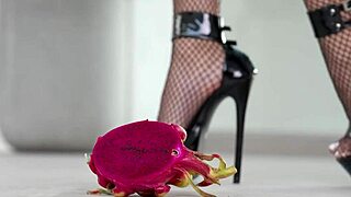 Petite Brunette Girl Crushes Fruits Under High Heels in Hot Foot Fetish Scene