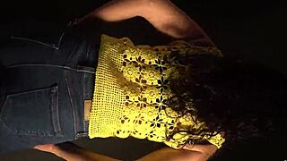 Moving butt and hips to the rhythm of the music in a sexy outfit with long nails