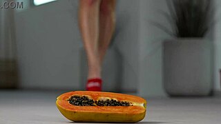 Petite Brunette Girl Crushes Fruits Under High Heels in Hot Foot Fetish Scene