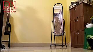 Regina Noir does yoga in the office, flashing her tight pussy