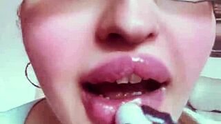 The goddess with huge glasses and nude lipstick enslaves you in kinky BDSM