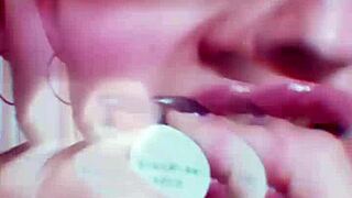 The goddess with huge glasses and nude lipstick enslaves you in kinky BDSM