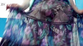 Hairy mature struts outdoors in a see-through dress