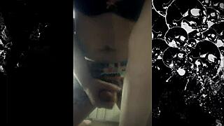 An amateur shemale named Khora Self masturbates with long legs and small tits.